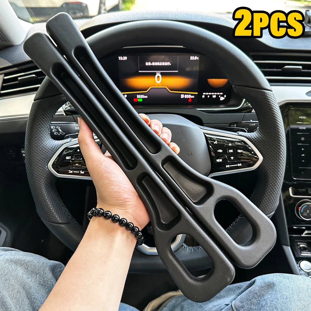 Hand holding two black SeatGuard gap filler strips inside a car