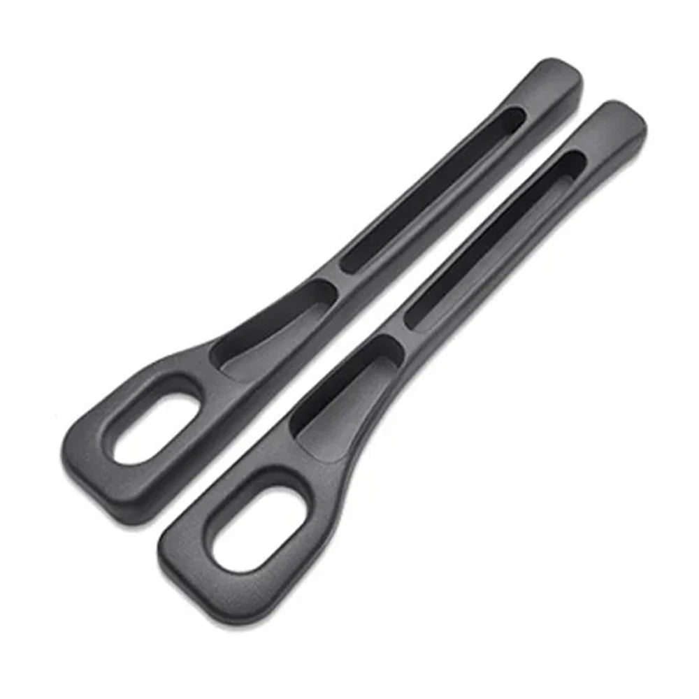Two black Renlori SeatGuard gap filler strips shown side by side on a white background